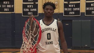 Reidsville basketball star tears down rim during dunk [upl. by Maren]